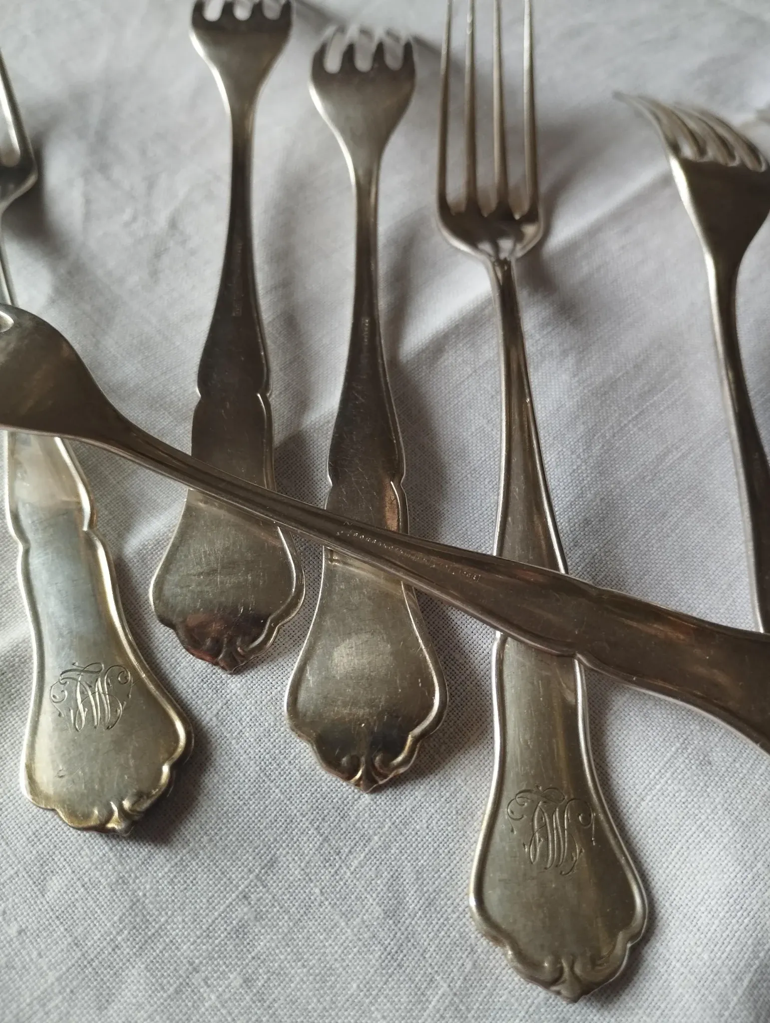 8 small numbered silver-plated forks Sorsakoski