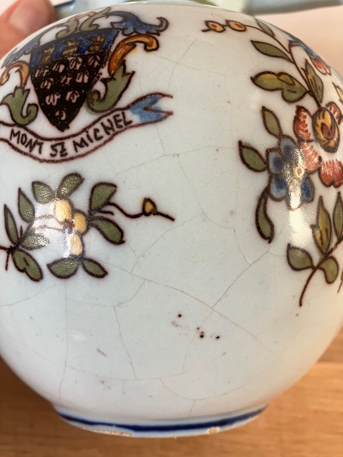 Old vase with floral motif inspired by desvres earthenware