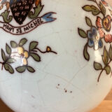 Old vase with floral motif inspired by desvres earthenware