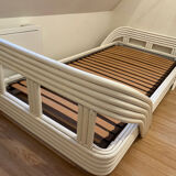Vintage white rattan bed from the 1960s.