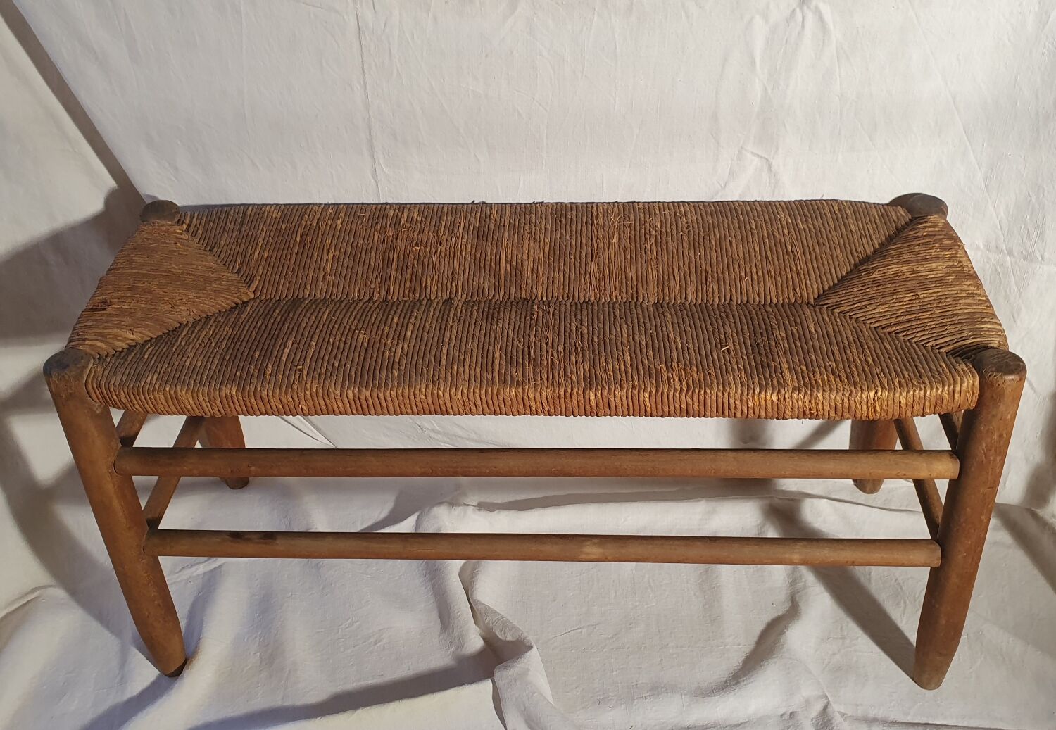 Wood and straw bench