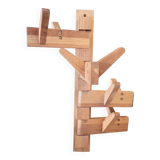 Articulated vertical wall coat rack