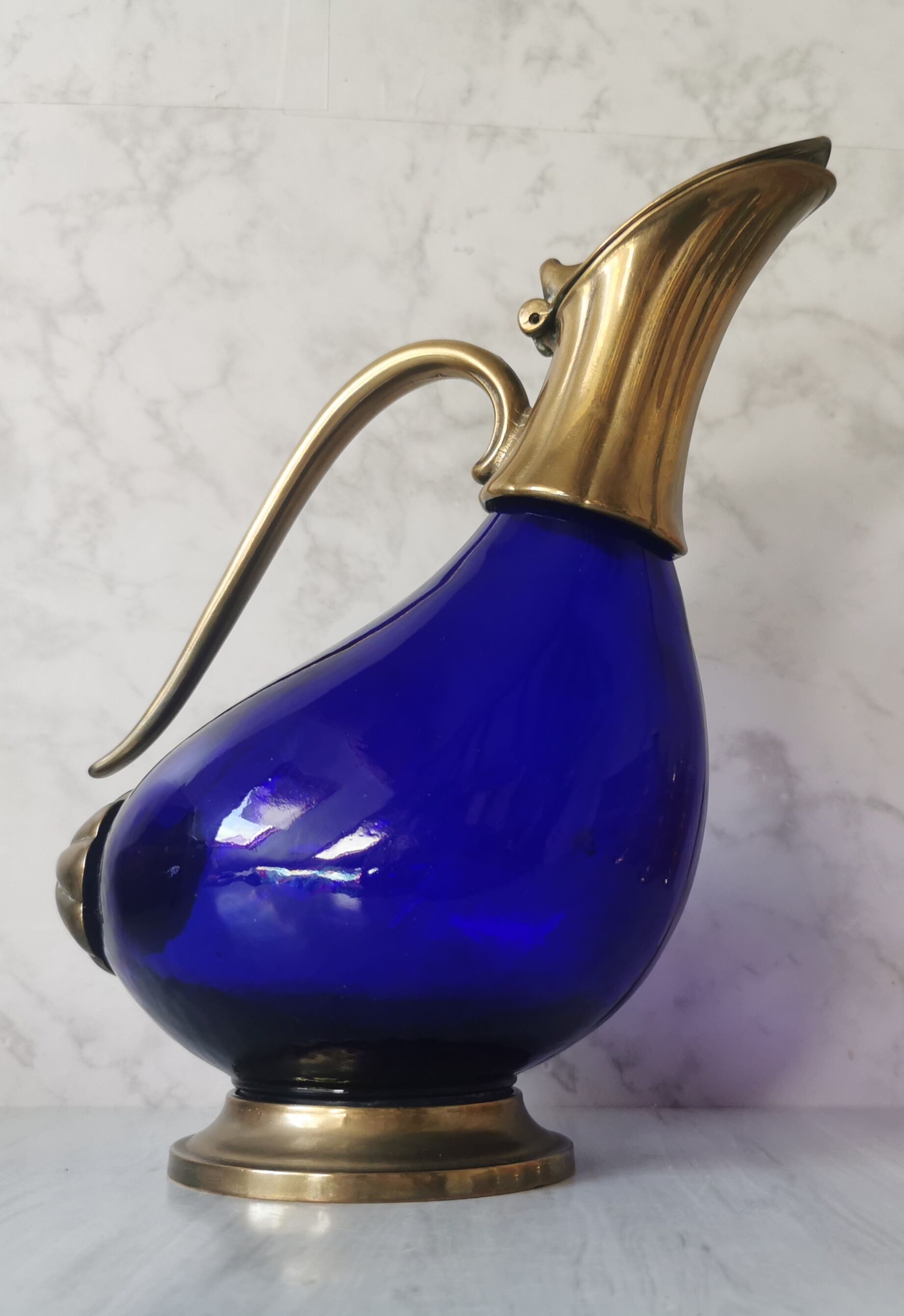 Glass and brass decanter