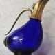 Glass and brass decanter
