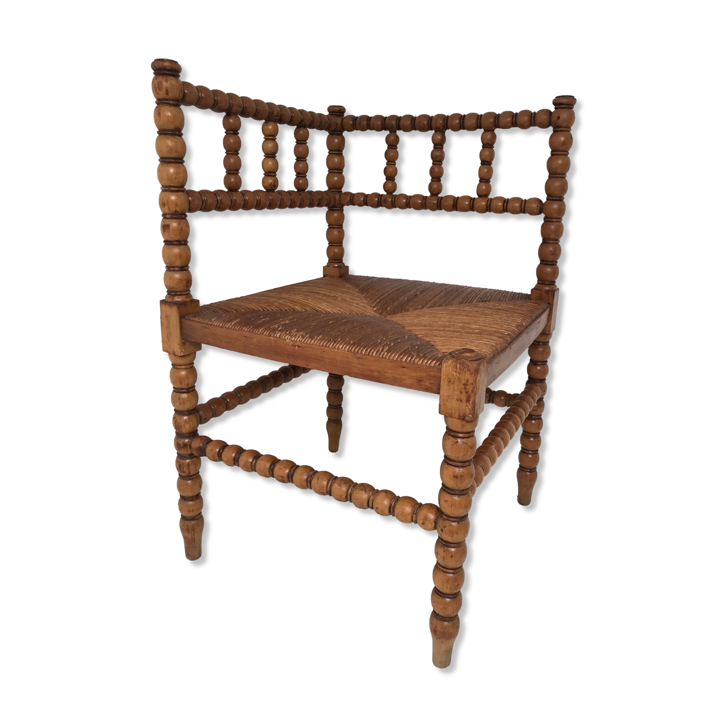 A wooden corner chair turned 1920s