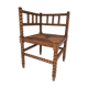 A wooden corner chair turned 1920s