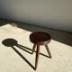 Brown solid wood stool seated circular dug