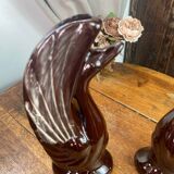 Pair of ceramic vases in the shape of swans.