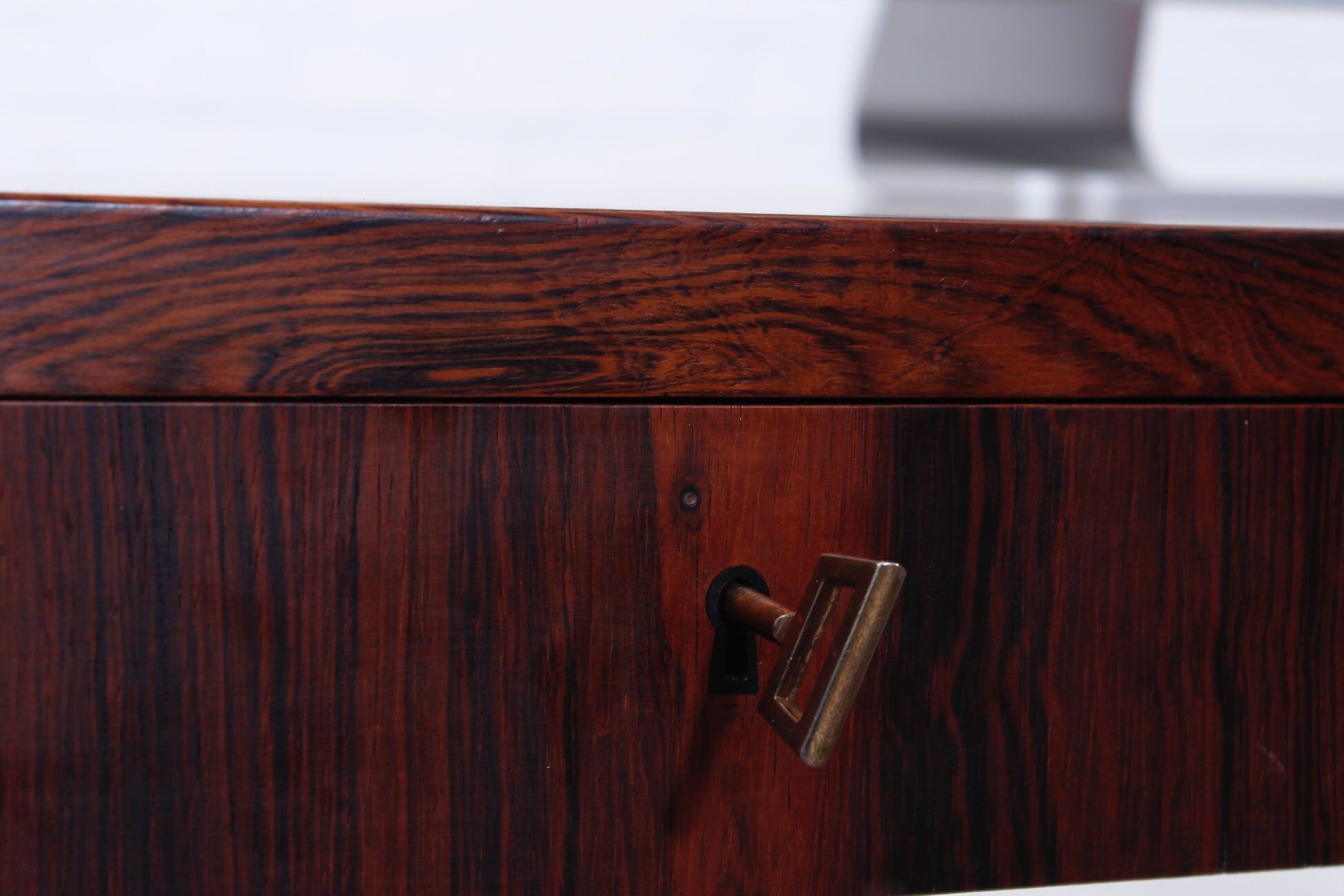 Minimalist rosewood desk by Riis Andersen