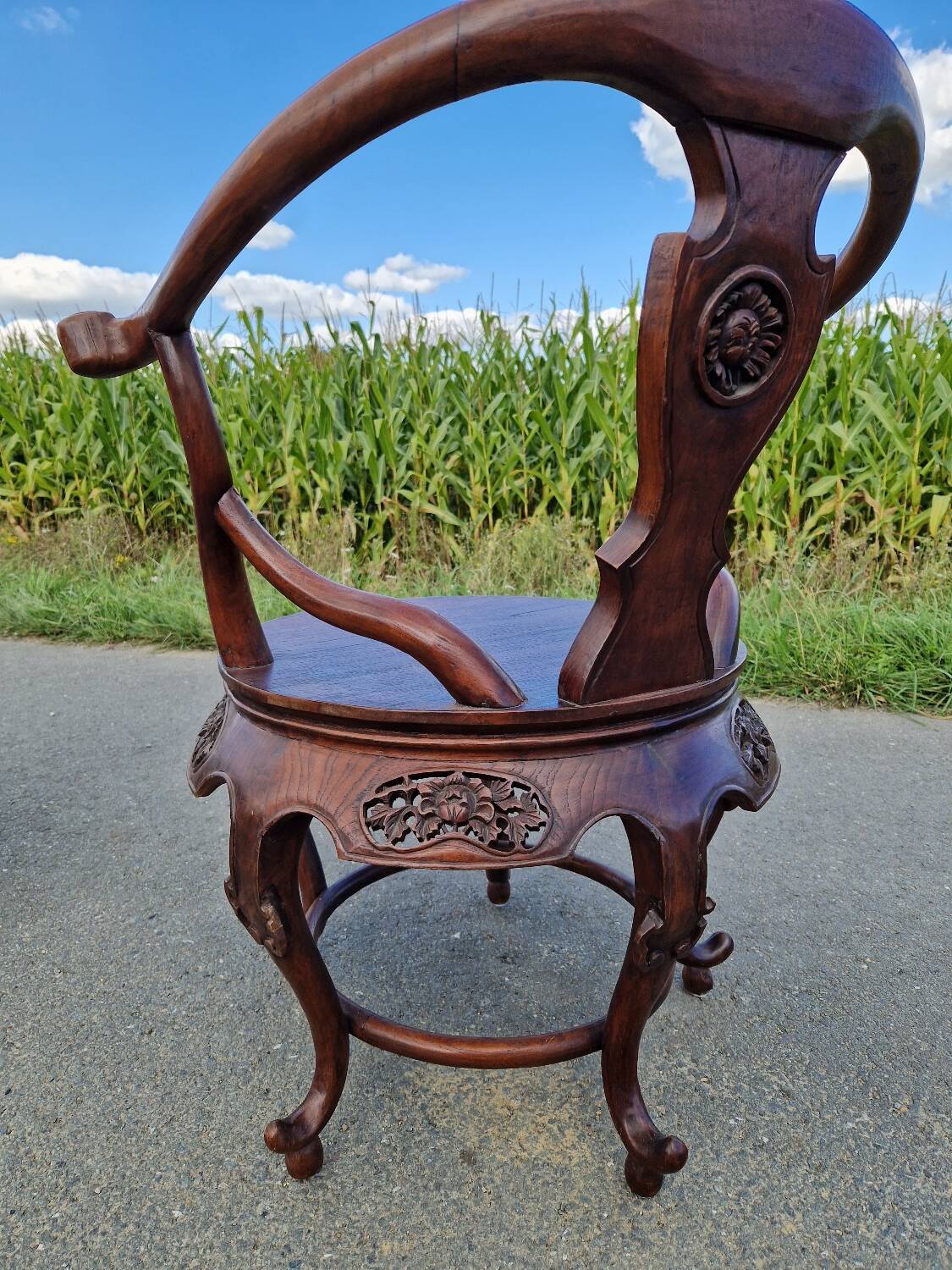 Pair of antique Chinese carved mahogany armchairs, circa 1960s