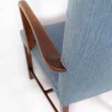 Armchair in mahogany and upholstered with light blue fabric by Fritz Hansen