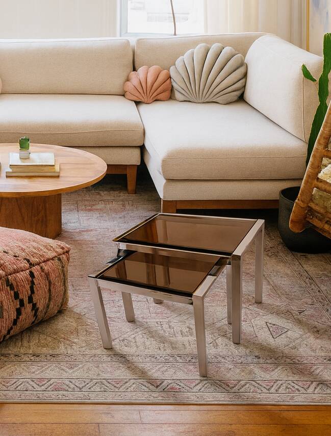 Vintage 1970s nesting tables in chrome and smoked glass, mid-century modernist style