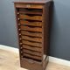 Antique mahogany roll-top filing cabinet with 10 drawers