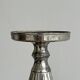 Candle holder with sculpted metal base, antique.
