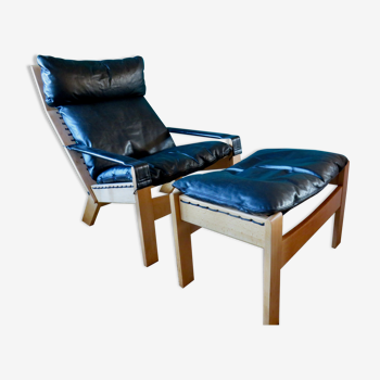 Armchair and ottoman, in black leather. D'Ingmar Relling for WestNOFA