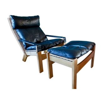 Armchair and ottoman, in black leather. D'Ingmar Relling for WestNOFA