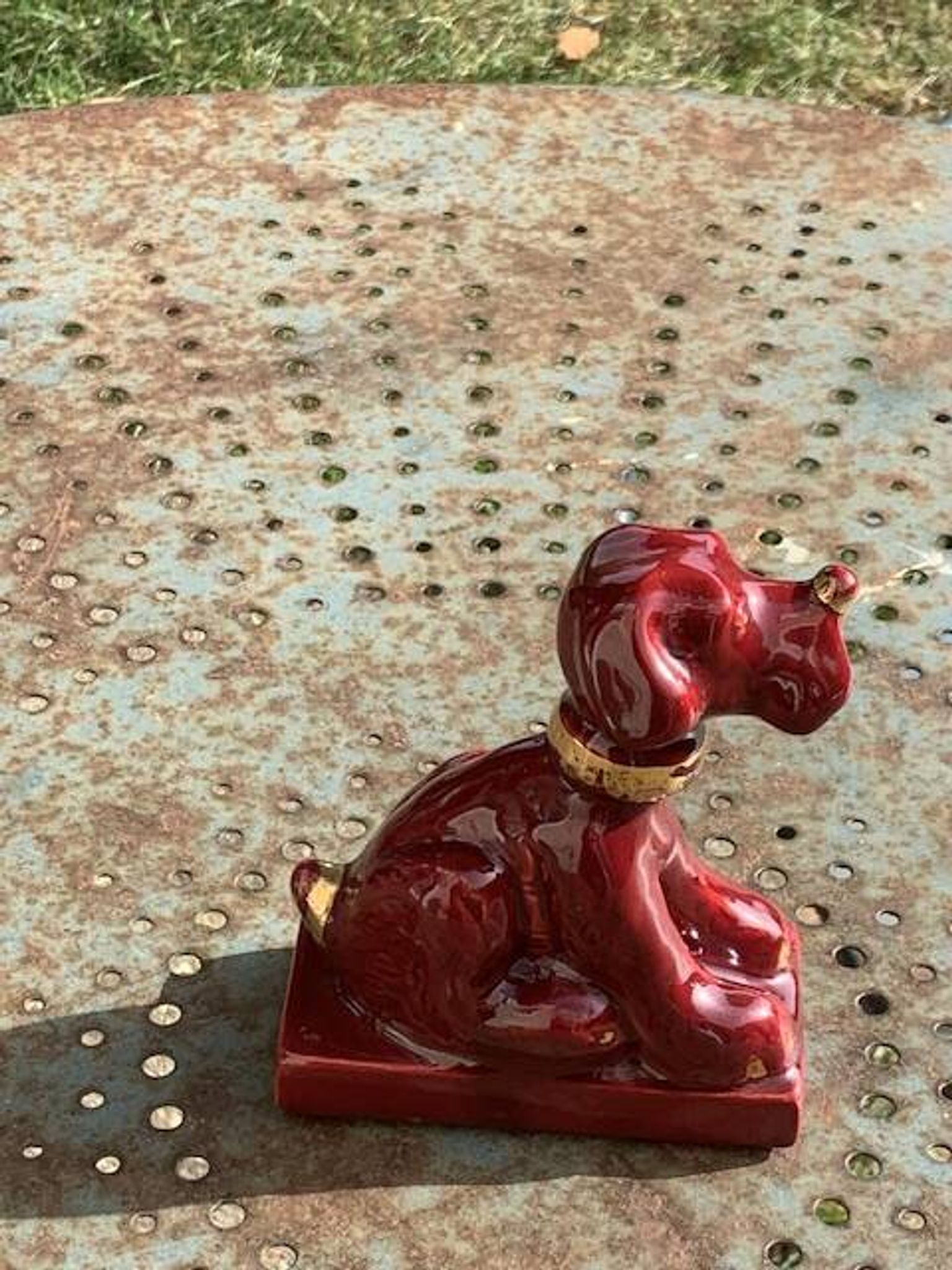 Dog sign CAB in vintage burgundy red enameled ceramic slip, art deco