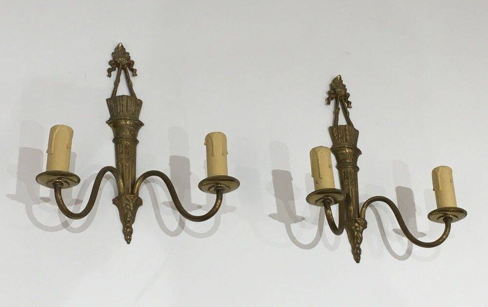 Pair of Louis XVI style bronze wall sconces with quivers and ribbons