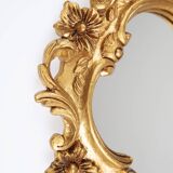 Baroque mirror in golden resin