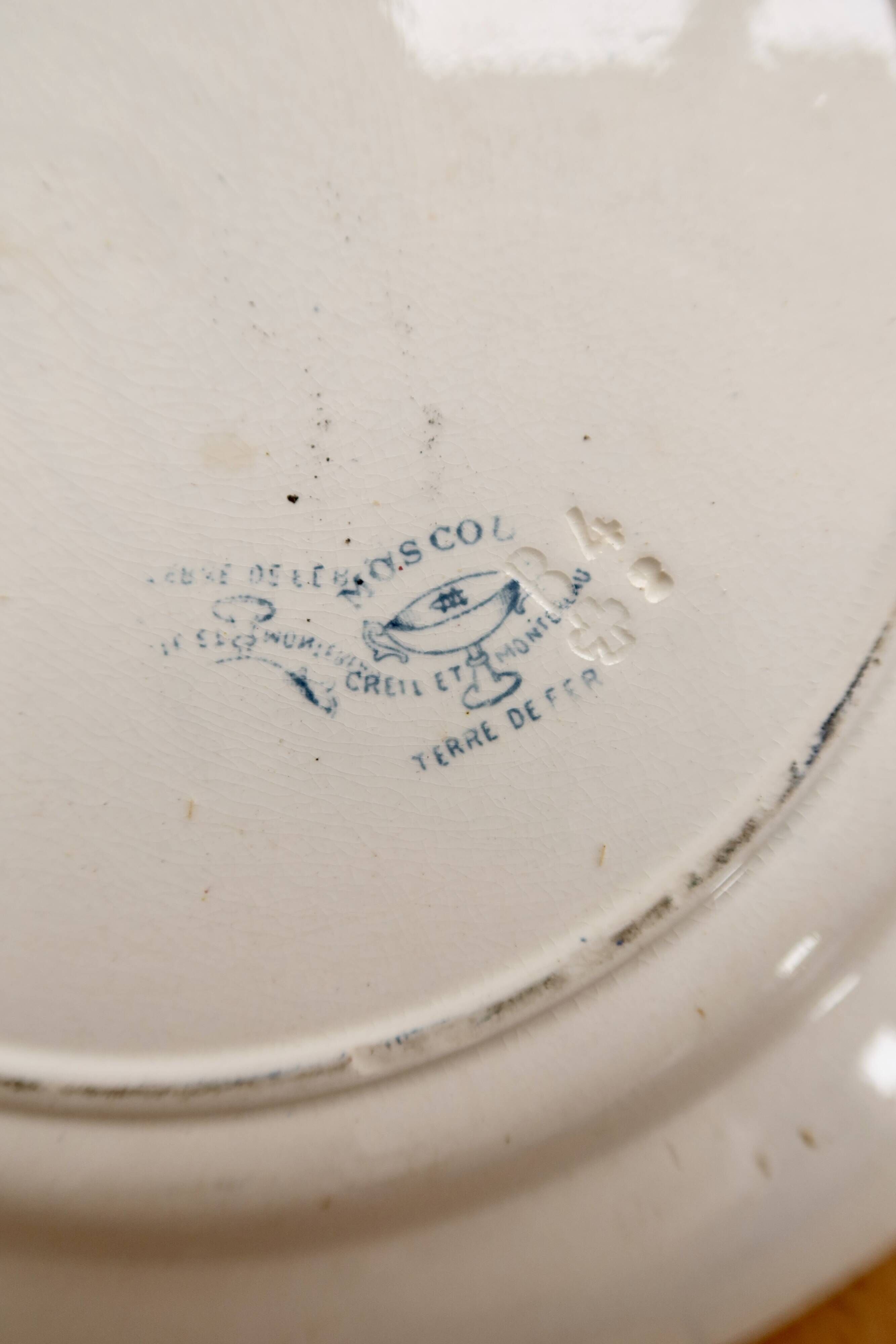 Round serving dish in Creil and Montereau ironstone - Blue decoration
