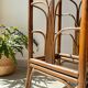Vintage rattan plant stand in Art Deco style