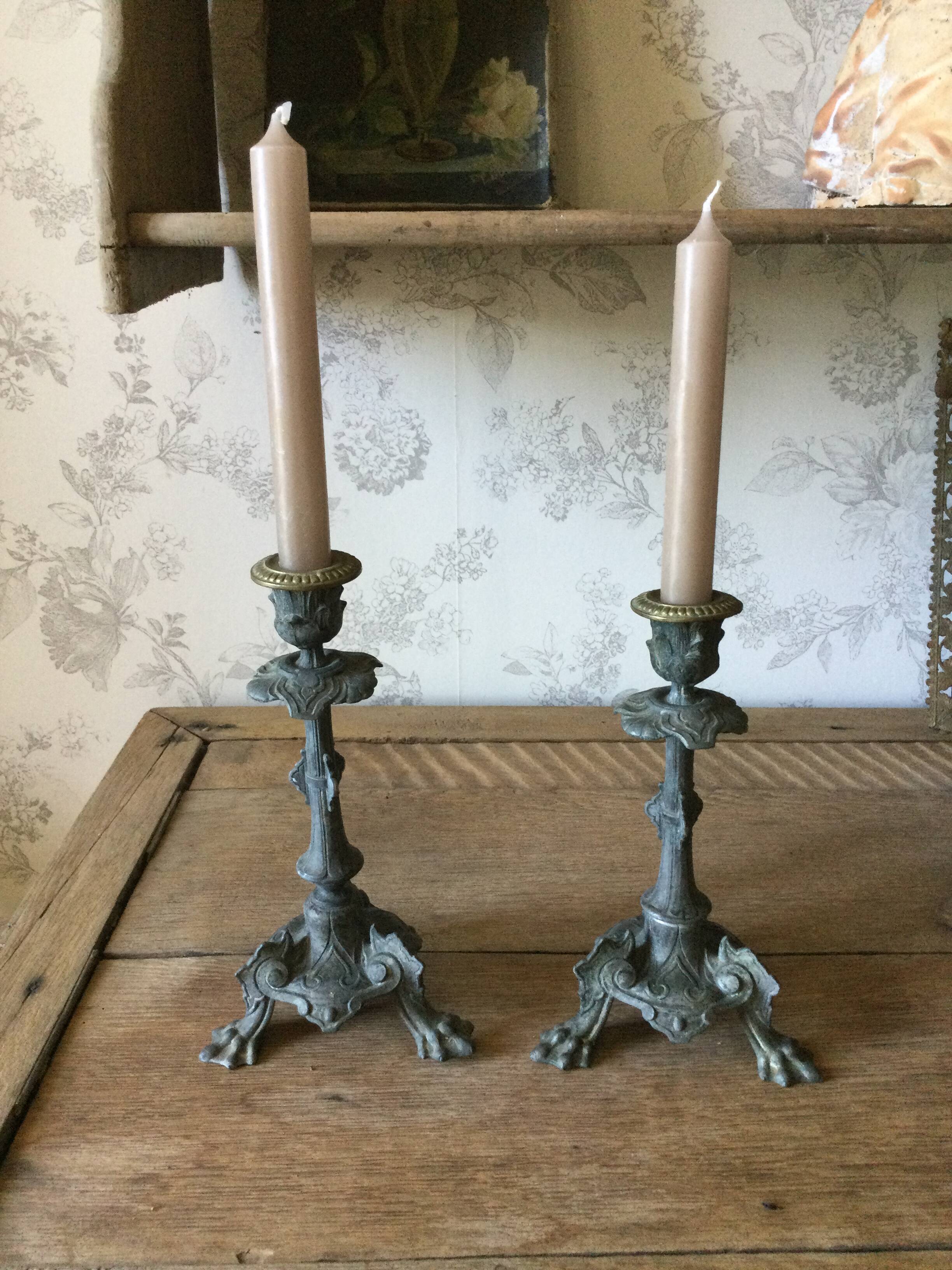 Set of 2 antique candlesticks in spelter.