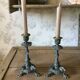 Set of 2 antique candlesticks in spelter.