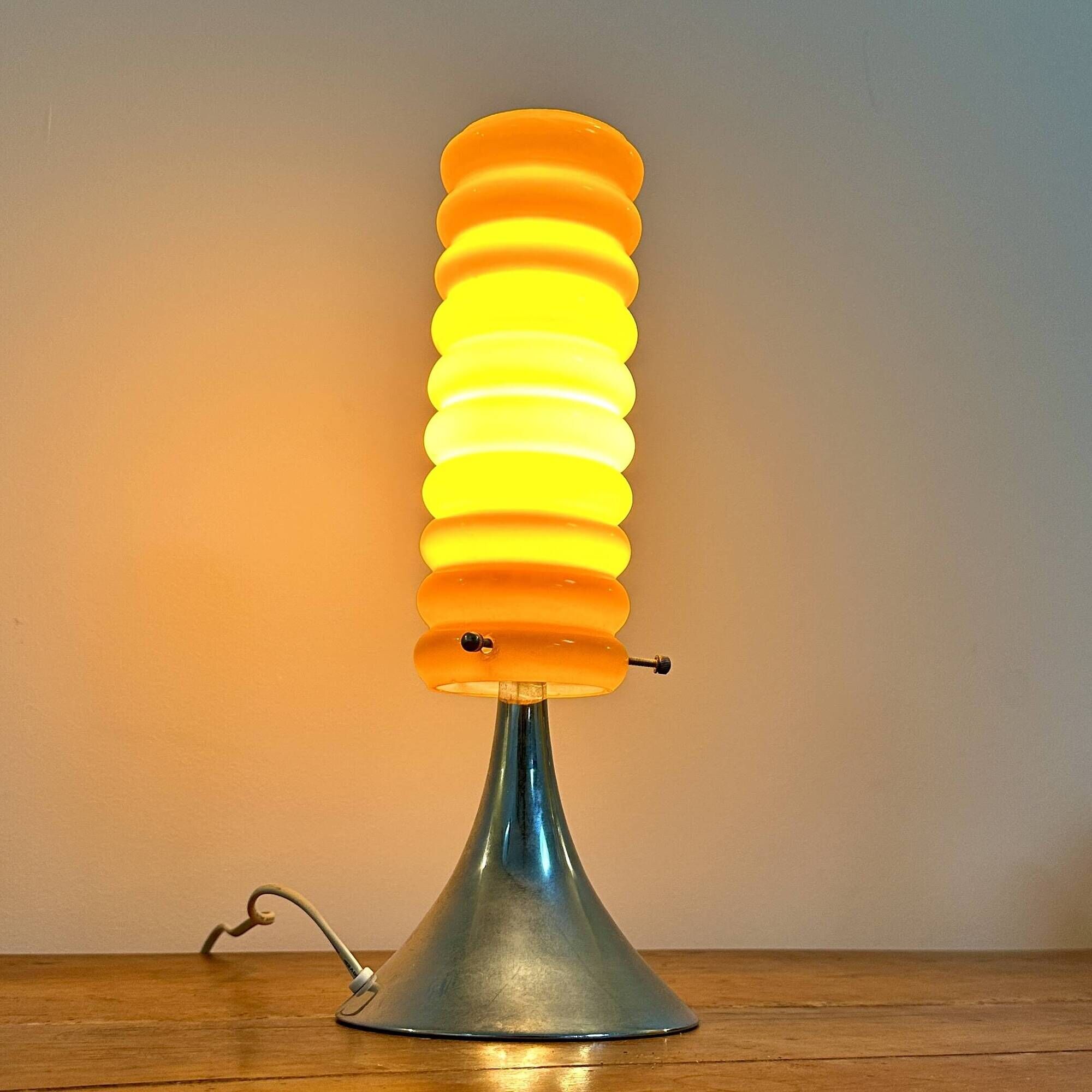 Vintage orange lamp with chrome tulip base and glass shade