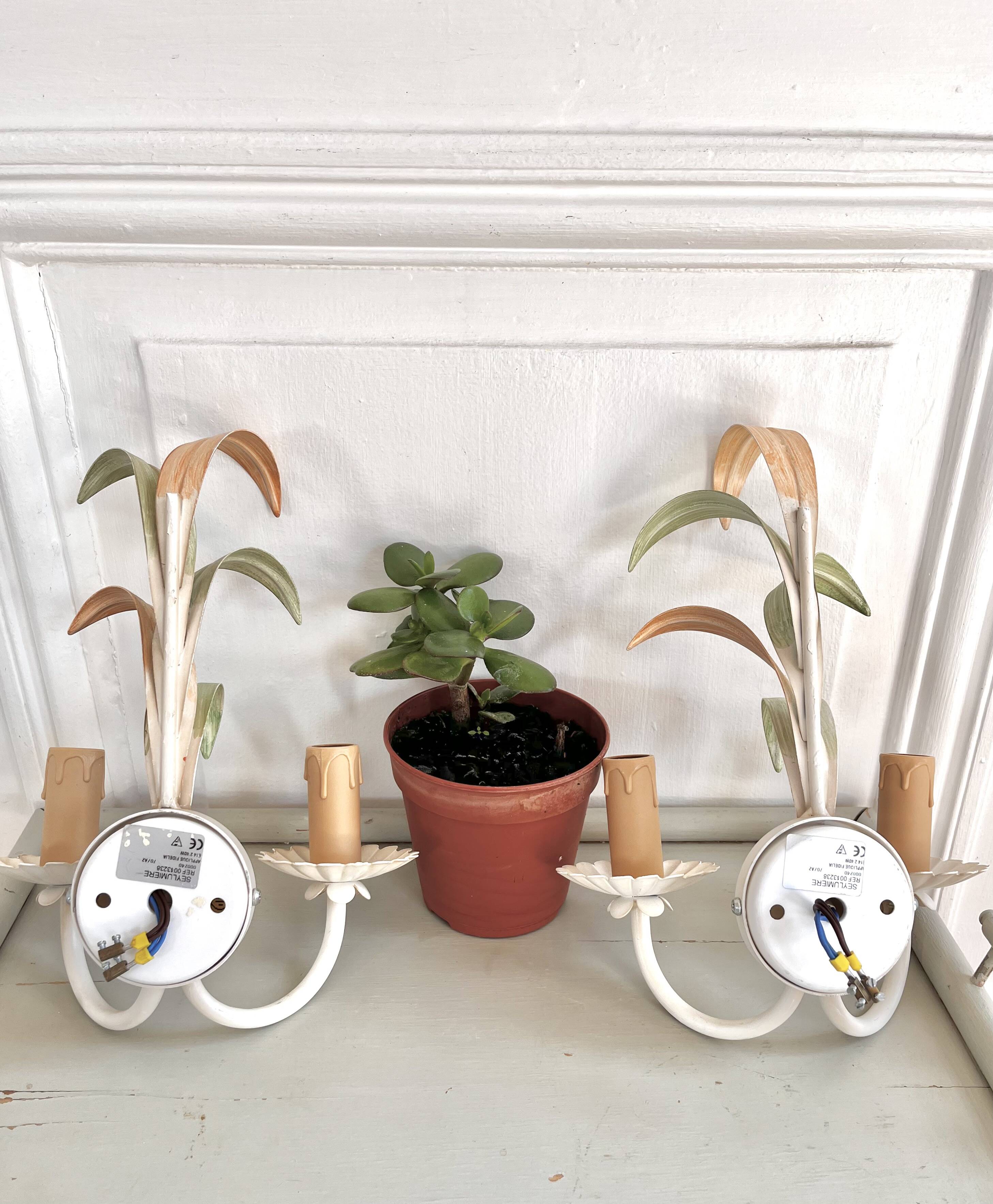 Pair of metal flower wall lights