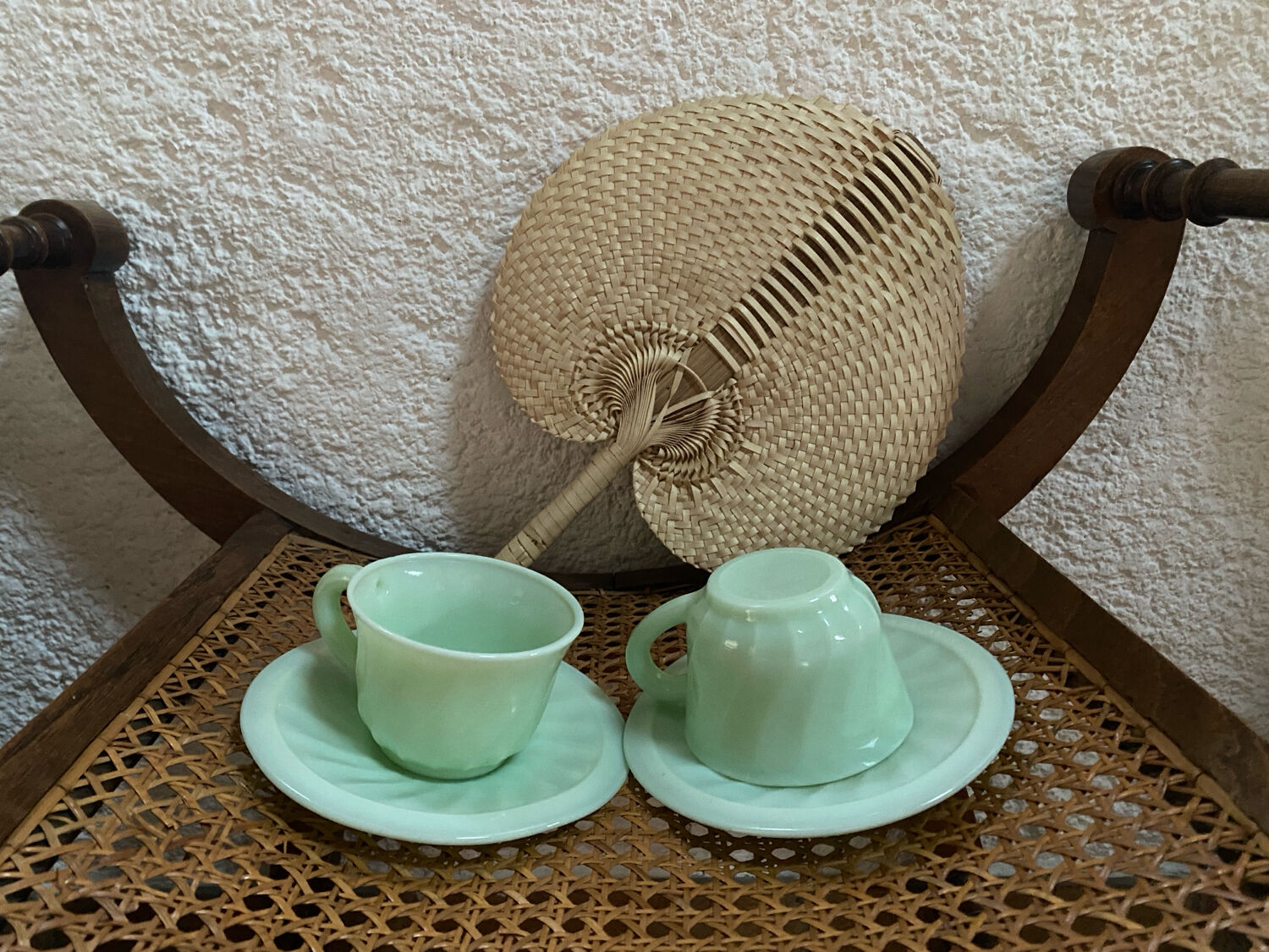 A pair of antique opaline coffee cups.