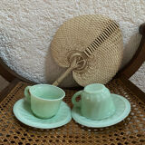 A pair of antique opaline coffee cups.