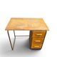 Vintage 1950s desk made of wood and metal with a 3-drawer unit.