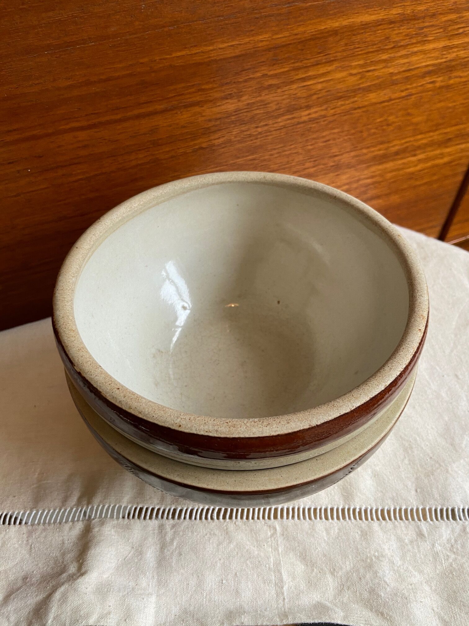 Pair of enamelled sandstone bowls