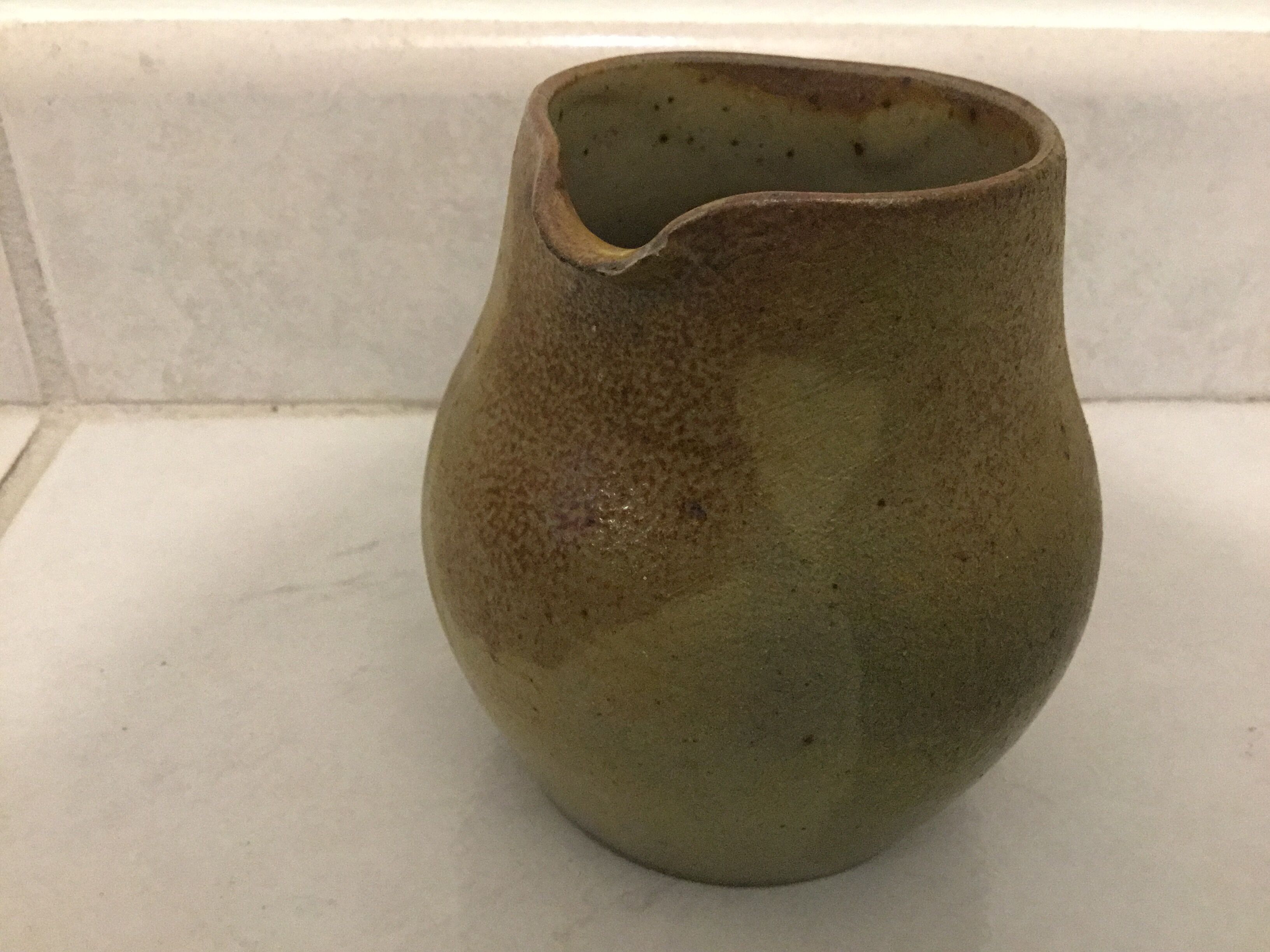 Sandstone milk pot