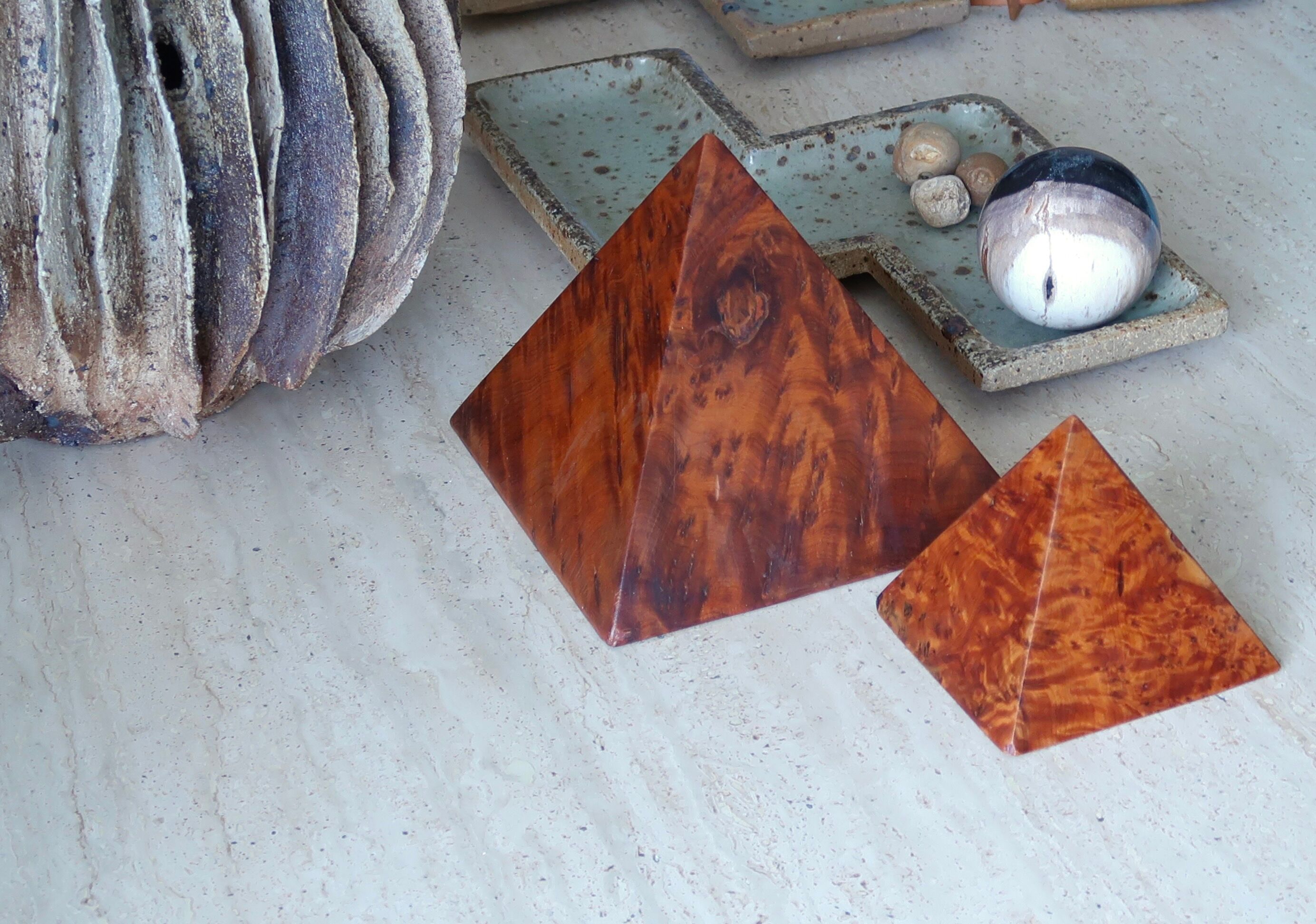 Two wooden pyramids with elm magnifying glass, 70s