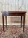 Folding game table – Louis XVI-Directoire style – Solid mahogany and brass