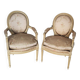 Old pair of Louis XVI style armchairs