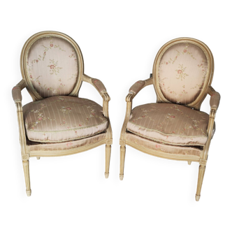 Old pair of Louis XVI style armchairs