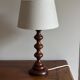 Turned wooden lamp