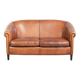 Sheepskin 2-seater sofa with a warm cognac brown colour scheme