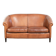 Sheepskin 2-seater sofa with a warm cognac brown colour scheme