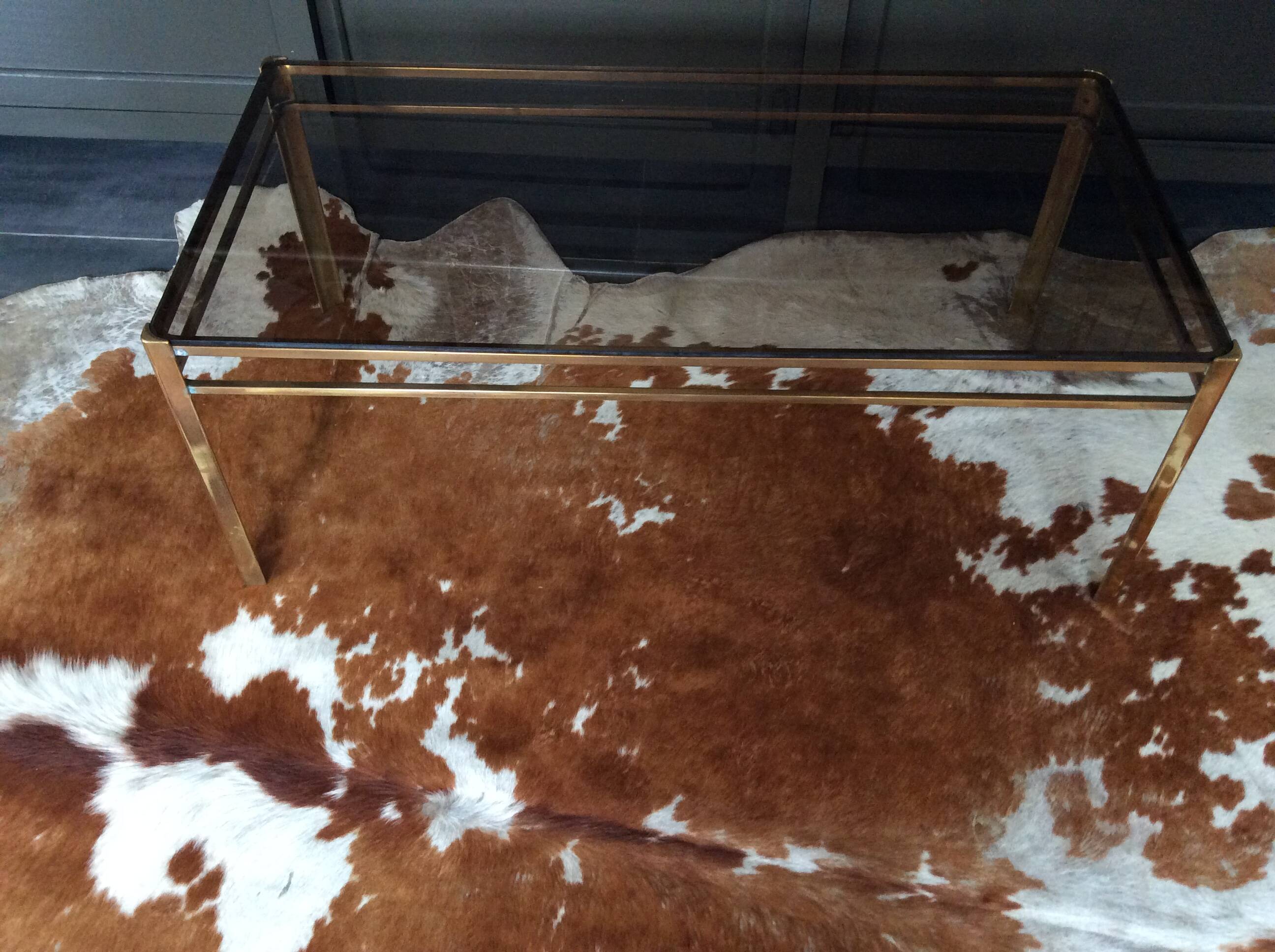 Glass and brass coffee table