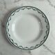 Set of 12 flat plates in Saint Amand earthenware, 22.5cm.