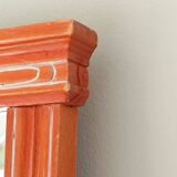 Beveled glass wall mirror in solid wood frame