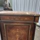 Support furniture with rosewood marquetry and marble top in the Napoléon III style.