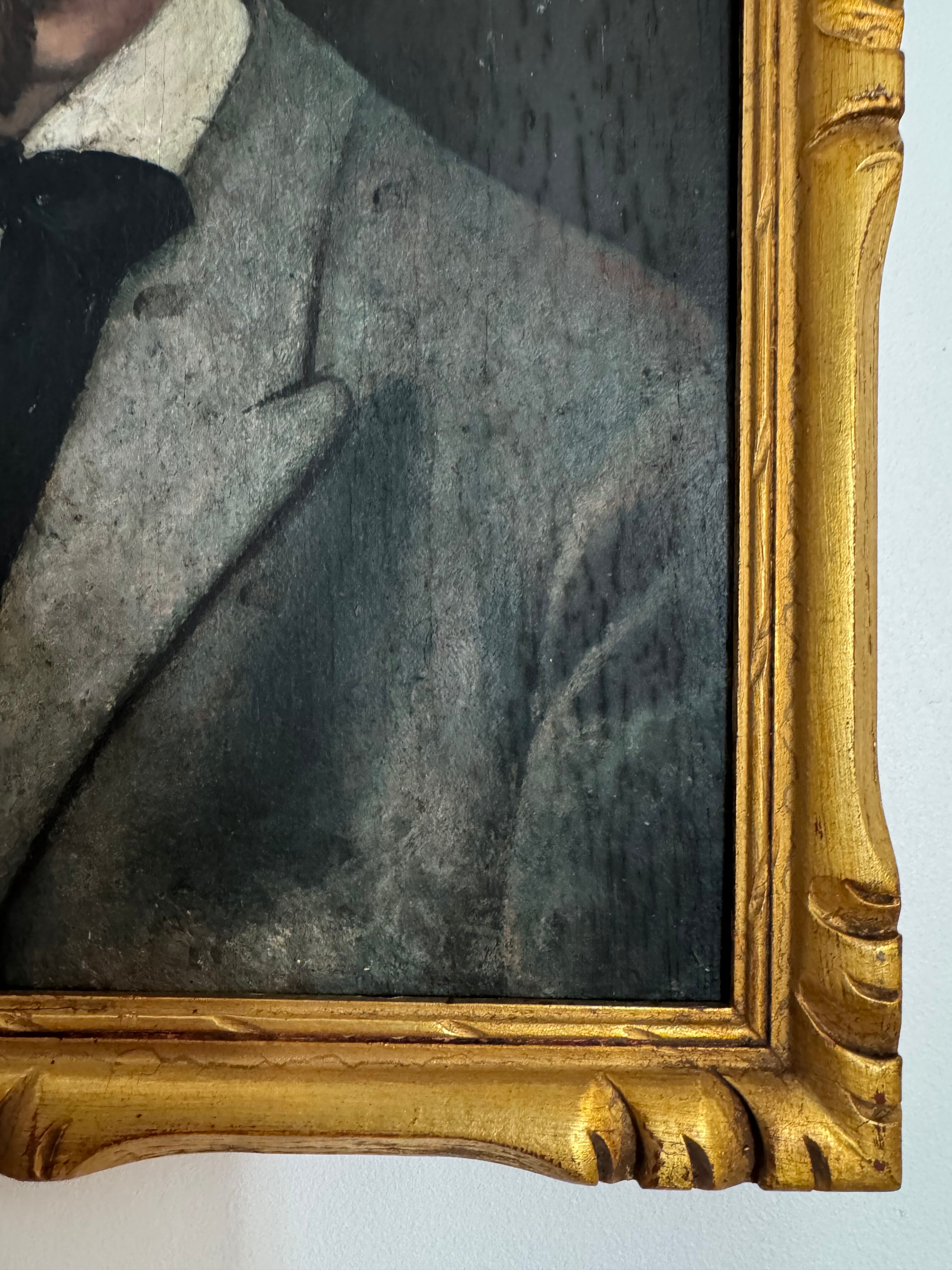 Portrait of a dandy with a moustache from the early 20th century.