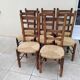 8 vintage straw chairs in the style of Charlotte Perriand.