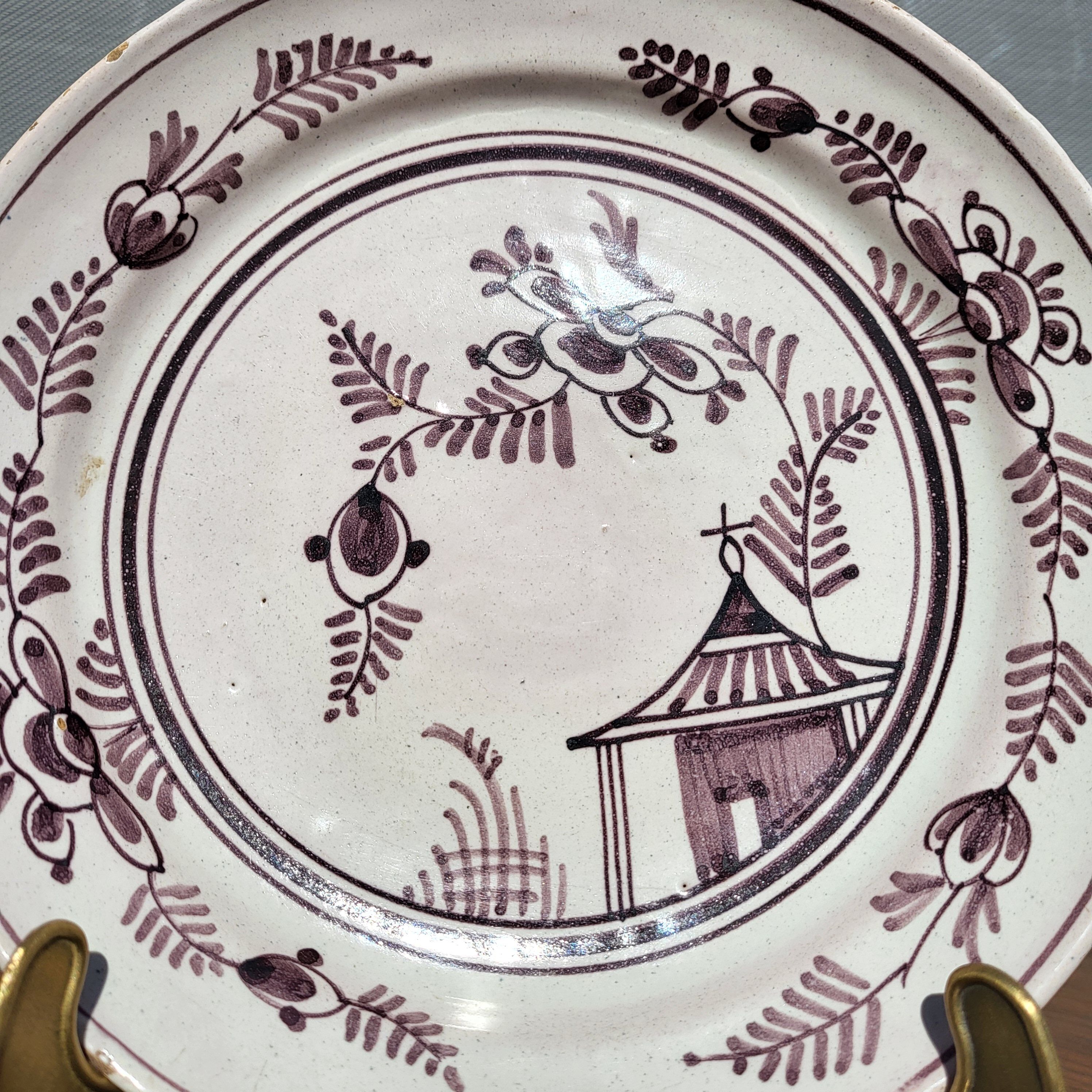 Grand Feu earthenware plate, Manganese decoration - 18th century
