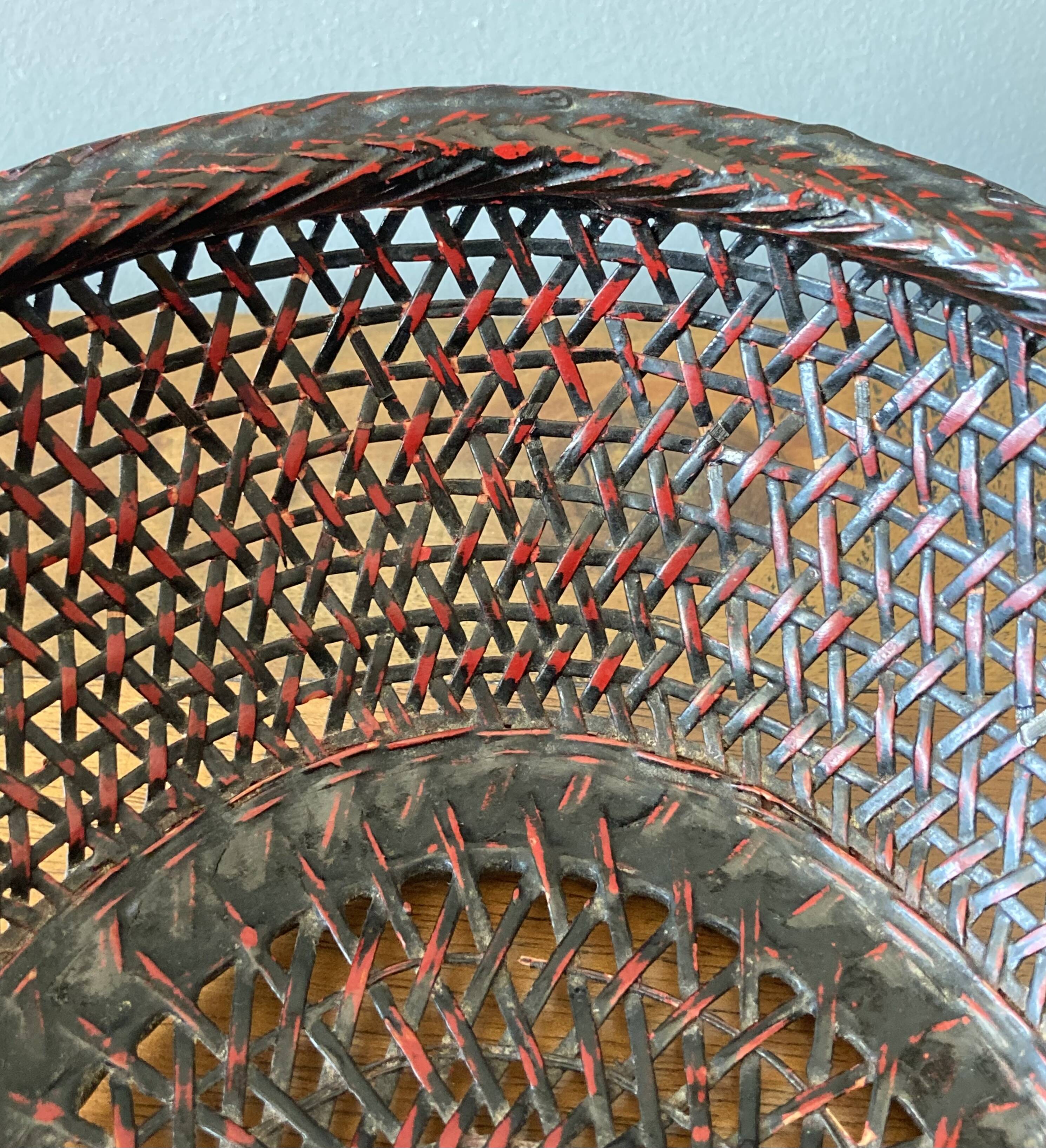 Japanese oval basket in negoro lacquered basketry (red lacquer on black background)