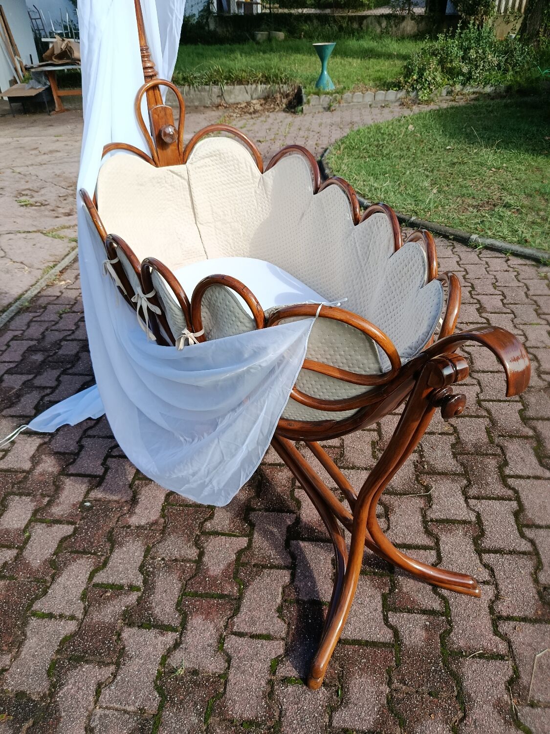 Antique cradle by J&J Khon